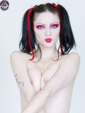 Pale skinned goth girl Scar poses naked after she takes off her black lace dress