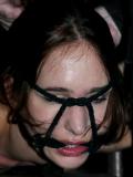 Tied up Calico Slave in gag mask made of black ropes gets her snatch vibrated.