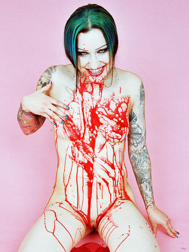 Naked blood covered tattooed alt model Jen Vixen demonstrates her naughty bits