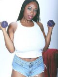 Black BBW Cassitty in blue jean shorts and white top keeps fit at the gym