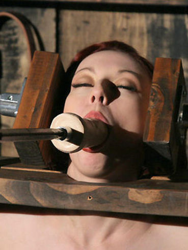 Restrained pierced nippled Sabrina Sparx rides the sybian and gets her mouth ruthlessly dildoed
