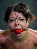 Chubby brunette Mia Gold is gagged, hogtied and her soft skin and nipples are whipped mercilessly