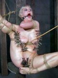 Rope bound completely naked slave blonde Cherry Torn gets tortured with clothespins