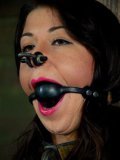 Mia Gold is in the center of this bondage gallery in which she is sucking deep.