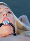 Bombshell Maia Davis gets gagged, tied up and her pink pussy slammed by a long metal dildo.