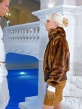 Blonde Lena Cova has clothed sex right in the swimming pool with her short fur coat on