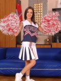 Eve Sanders in her favorite cheerleader uniform before getting filled with a massive cock.