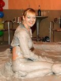 Playful Barbara Summer believes that group wrestling in the mud is such a fun