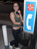 Cute oriental girl Jenna E in jeans displays her feet in the streets at nighttime