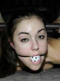 Ball gagged Sasha Grey gives a hot view of her shaved crotch then gets double stimulated.