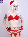 White haired goth model Razor Candi in red Christmas lingerie shows off her tits