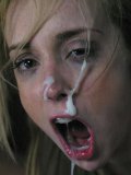 Petite slave blonde Kelly Wells has sperm on her face after painful ass fucking
